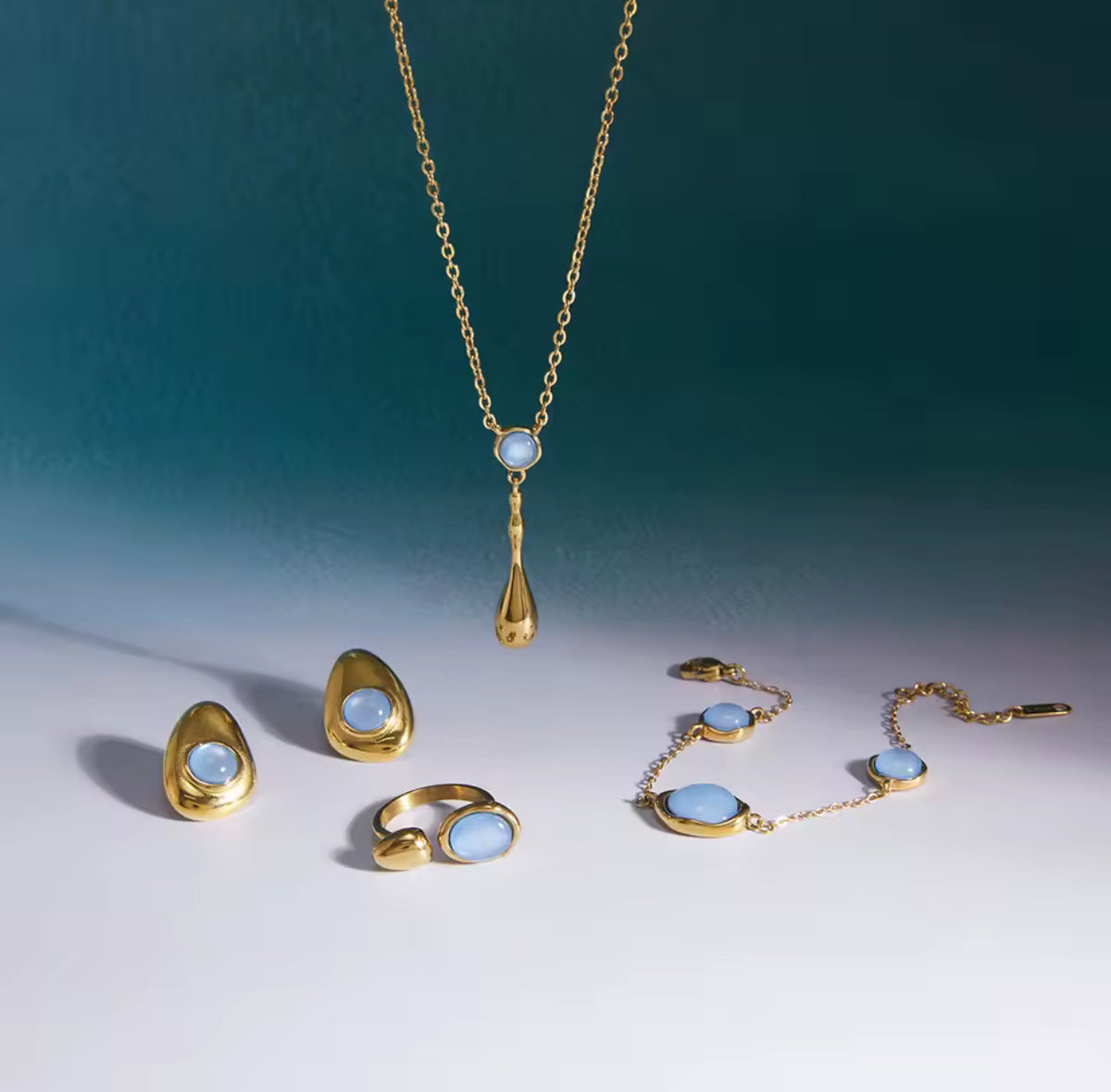 Kika Classic Blue Resin Necklace Earrings Bracelet Ring