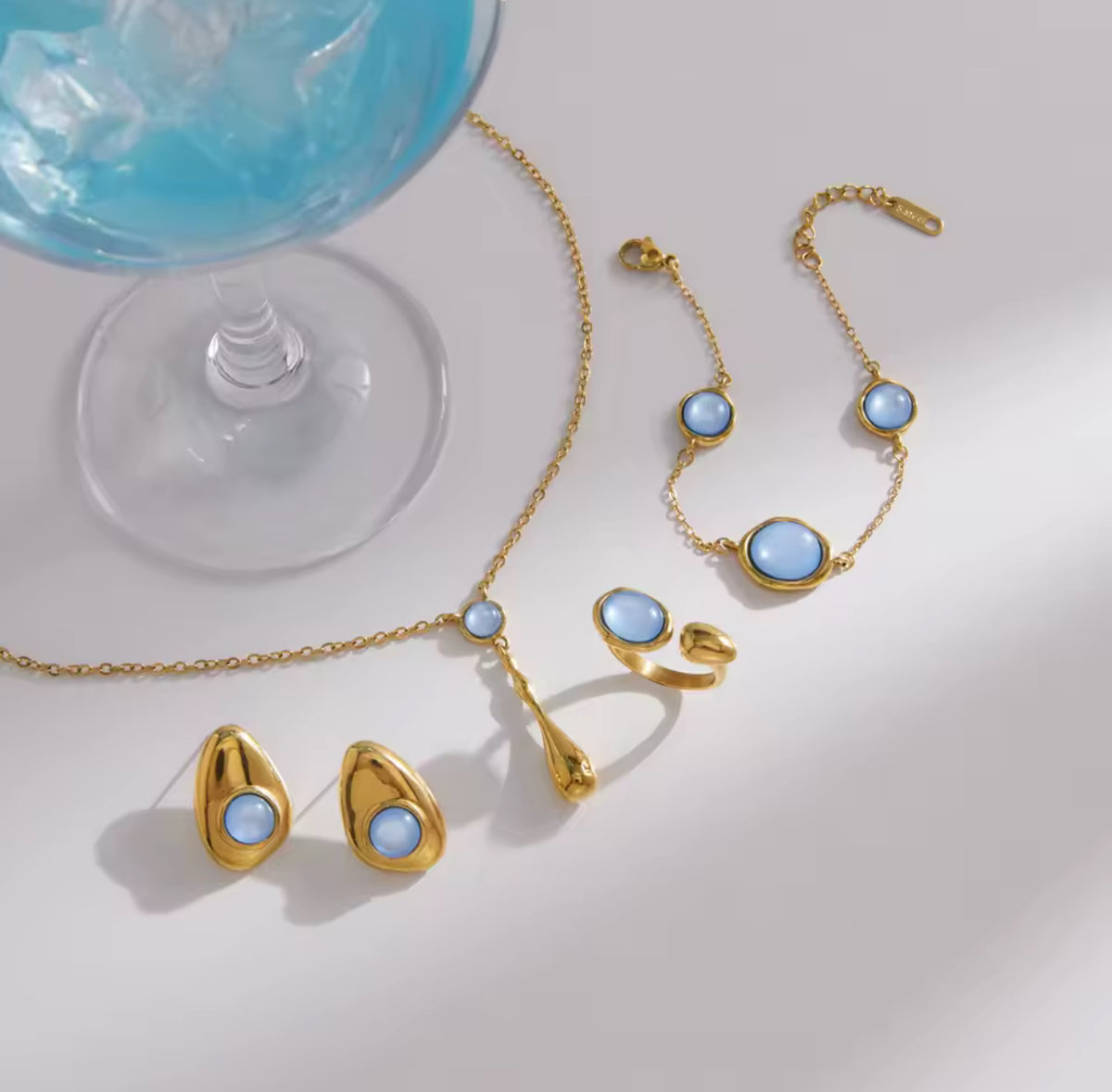 Kika Classic Blue Resin Necklace Earrings Bracelet Ring