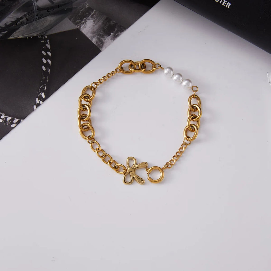 Kika Minimalist Classic 18K Gold Color Plated Bowknot Pendant Glass Pearl Bracelet Waterproof Stainless Steel