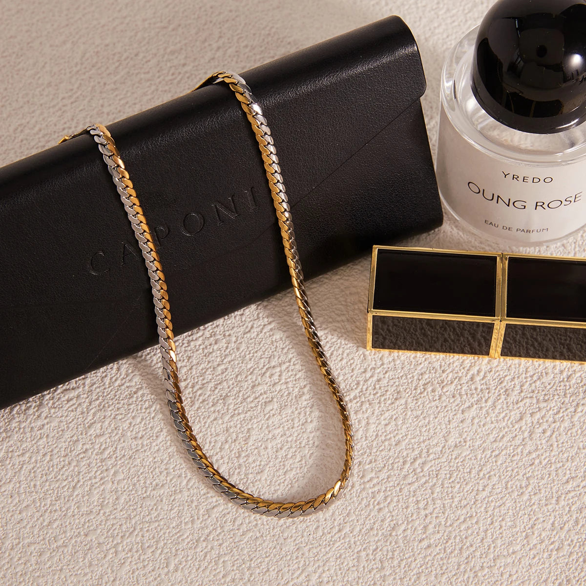 Cuban chain necklace in embossed of gold and silver blocks