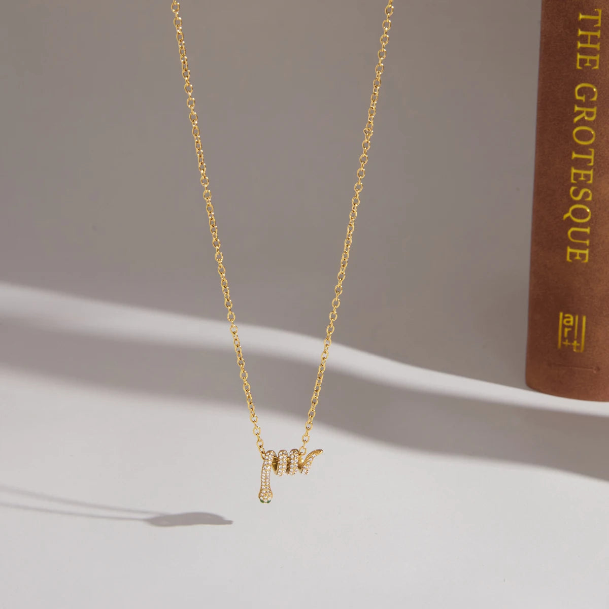 Kika Delicate Crystal Snake Pendant Necklace