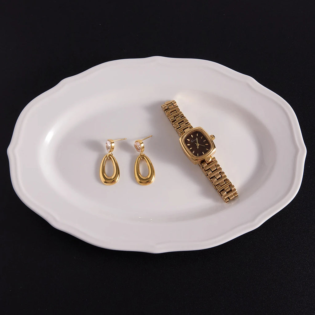 Kika Water Drop Shaped Hollow Pendant Earrings