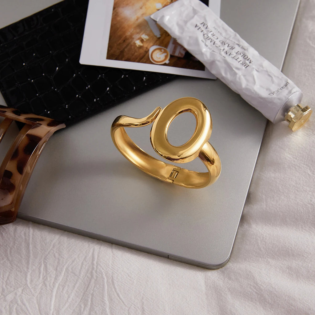 Kika Minimalist Line Asymmetric Engraved O-shaped Hollow Spring Opening Bracelet 18K PVD Stainless Steel