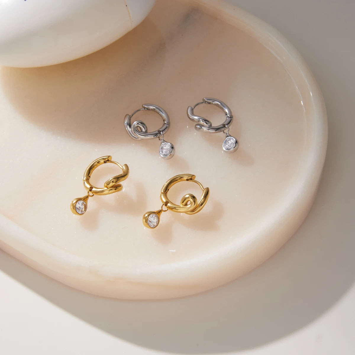 Kika Round Zircon Pendant Wave Shape Twisted Clip Earrings