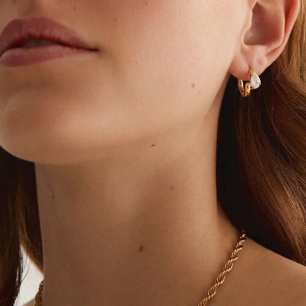 Kika Delicate White Teardrop Shaped Zircon Twisted Wave Stud Earrings