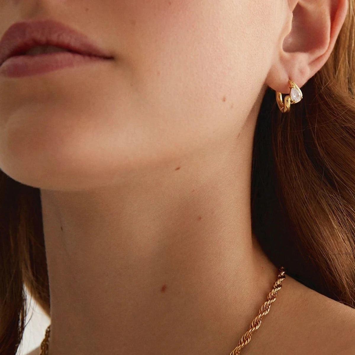 Kika Delicate White Teardrop Shaped Zircon Twisted Wave Stud Earrings