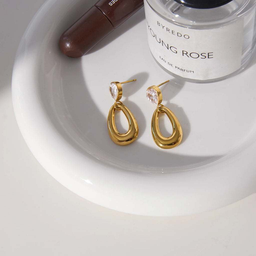 Kika Water Drop Shaped Hollow Pendant Earrings
