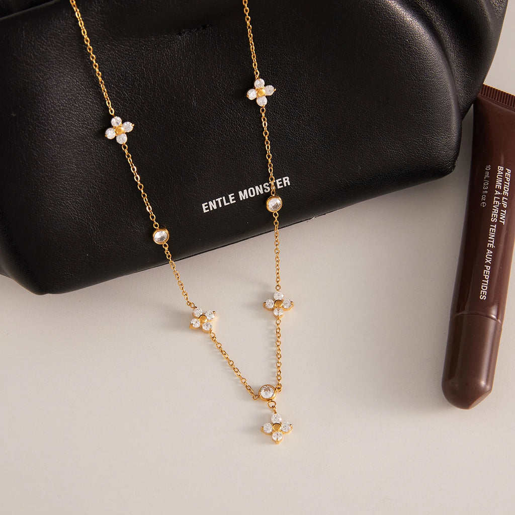 Kika Classic Gold Plated Elegant flowers White Zircon Chain Necklace