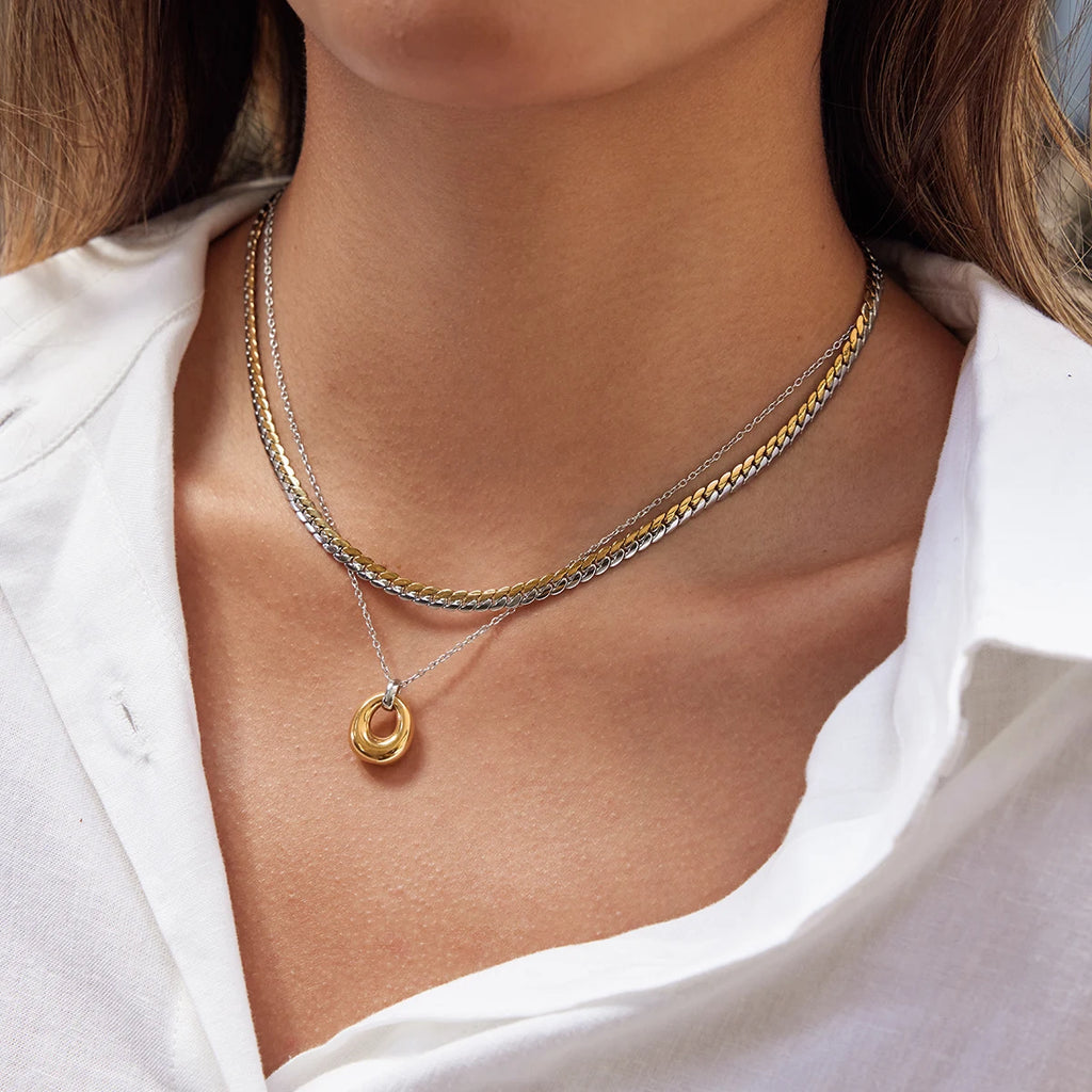 Cuban chain necklace in embossed of gold and silver blocks