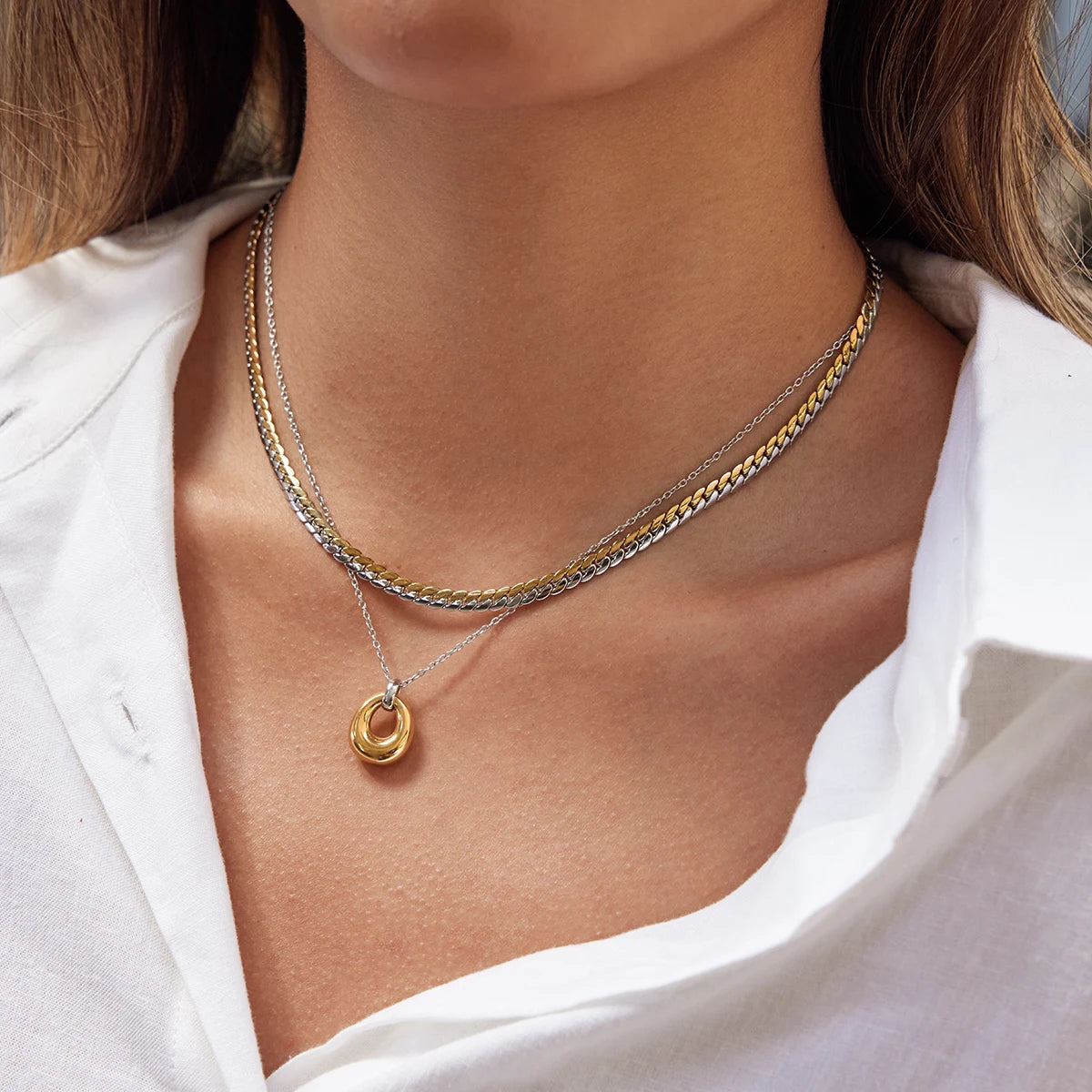 Cuban chain necklace in embossed of gold and silver blocks