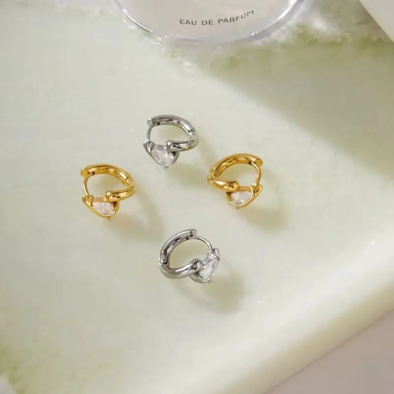 Kika Delicate White Teardrop Shaped Zircon Twisted Wave Stud Earrings