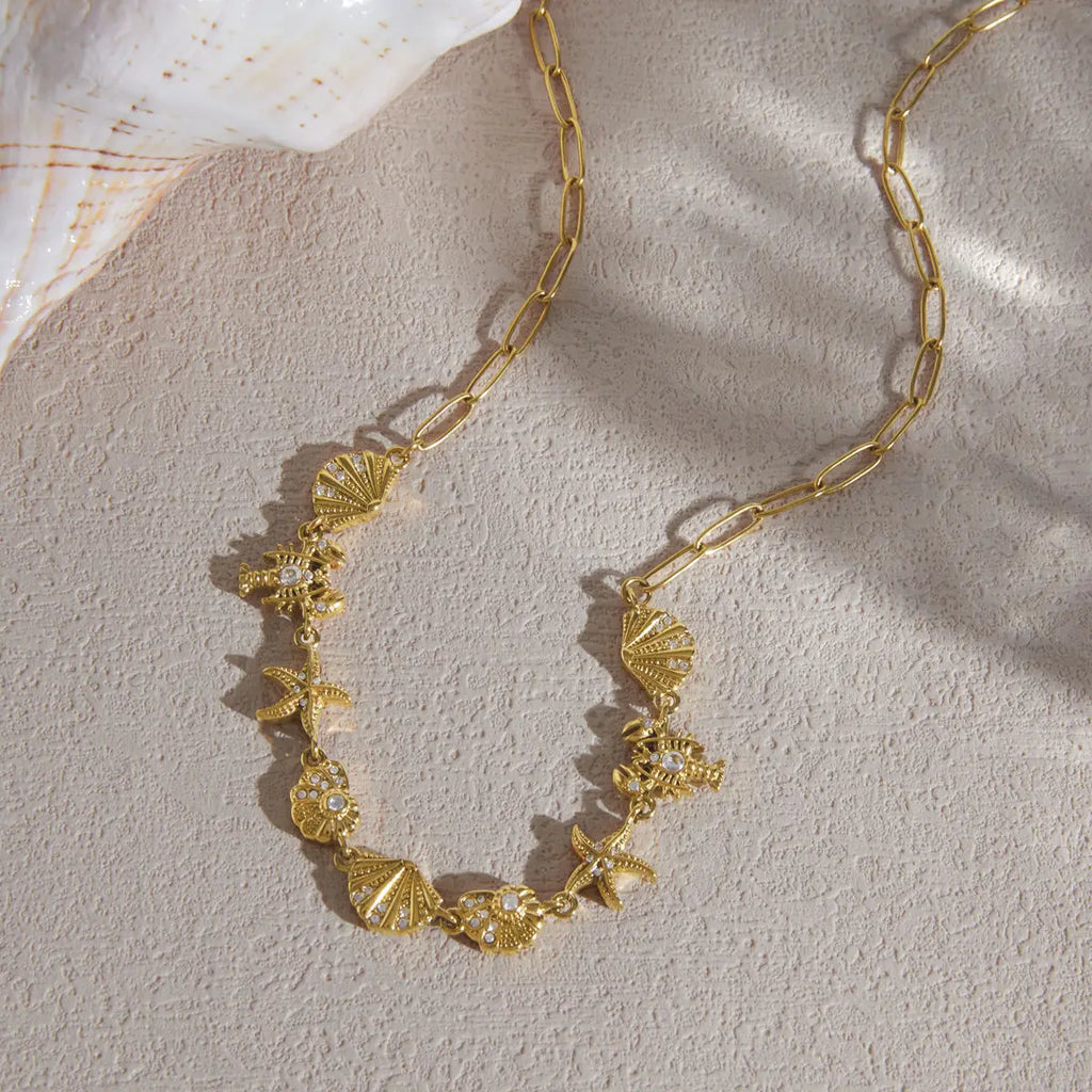 Kika Rhinestone Turtle Lobster Conch Starfish Necklace