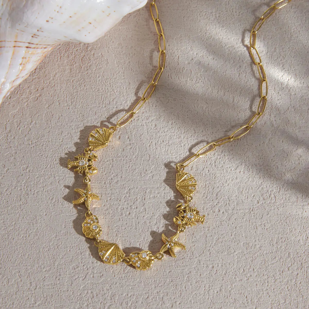Kika Rhinestone Turtle Lobster Conch Starfish Necklace