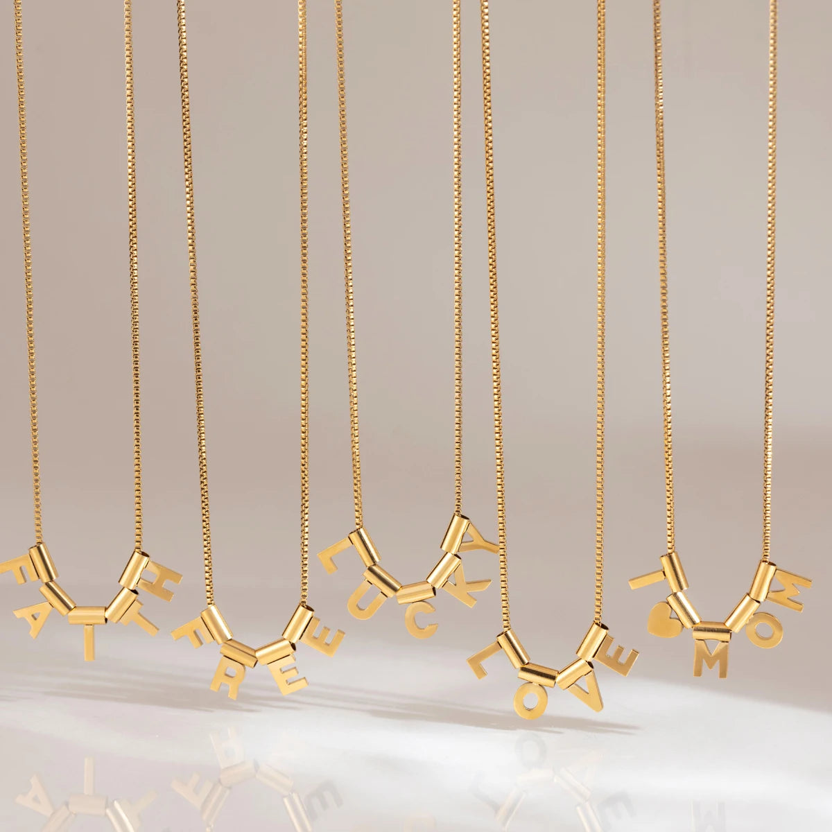 KIKA Slideable Letter Pendant Necklace  18K Gold PVD Plated Stainless Steel 316Lt