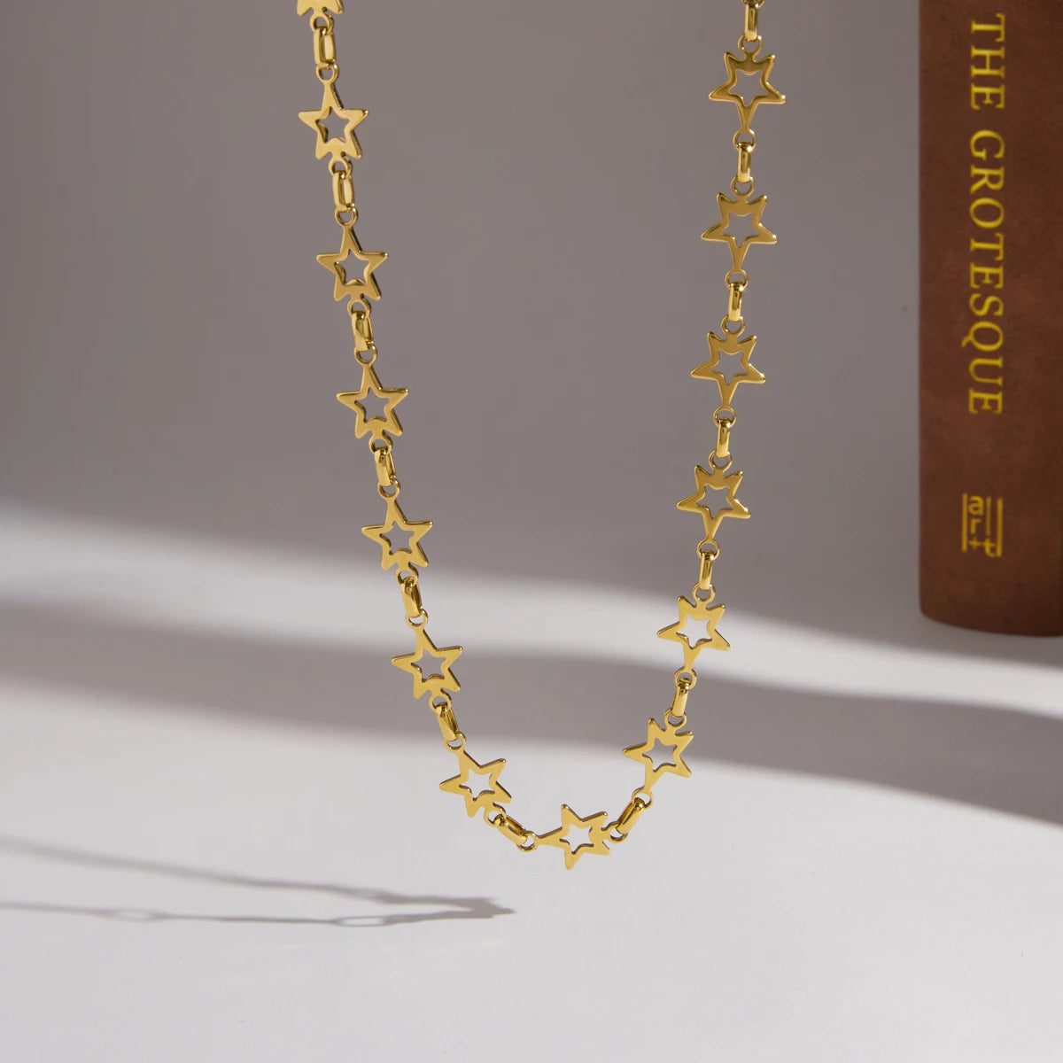 Kika Classic Hollow Out Stars Splicing Chain Necklace