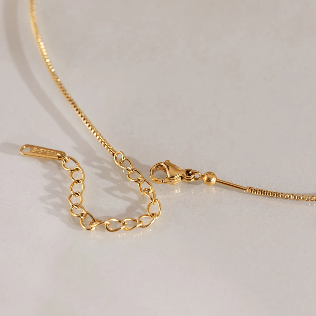 KIKA Slideable Letter Pendant Necklace  18K Gold PVD Plated Stainless Steel 316Lt