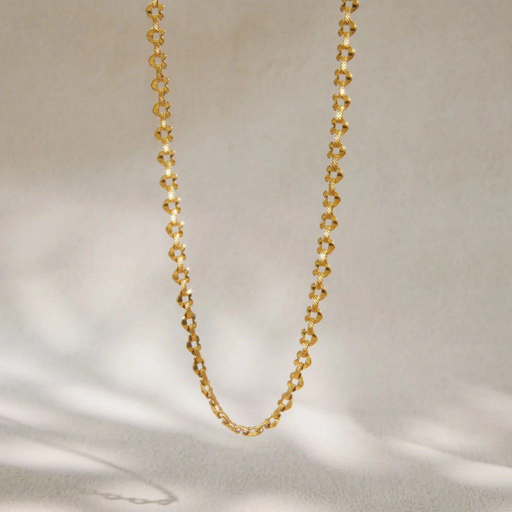 Kika Classic Gold Color Hollow Heart Necklace