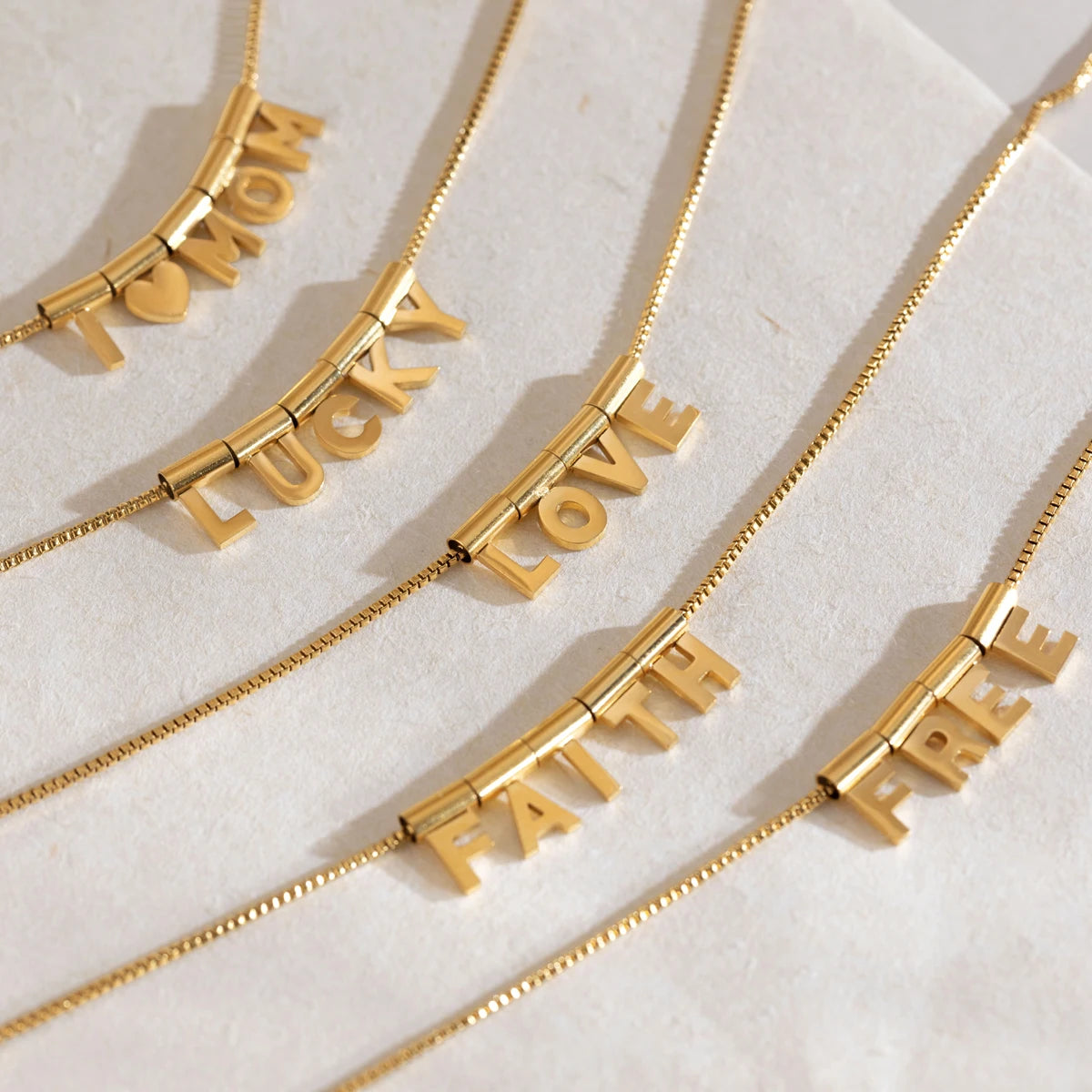 KIKA Slideable Letter Pendant Necklace  18K Gold PVD Plated Stainless Steel 316Lt
