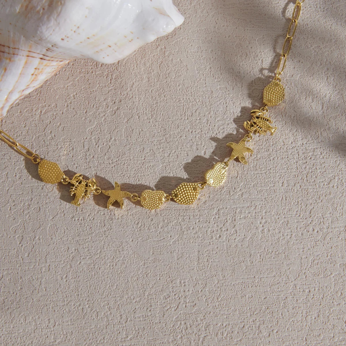 Kika Rhinestone Turtle Lobster Conch Starfish Necklace