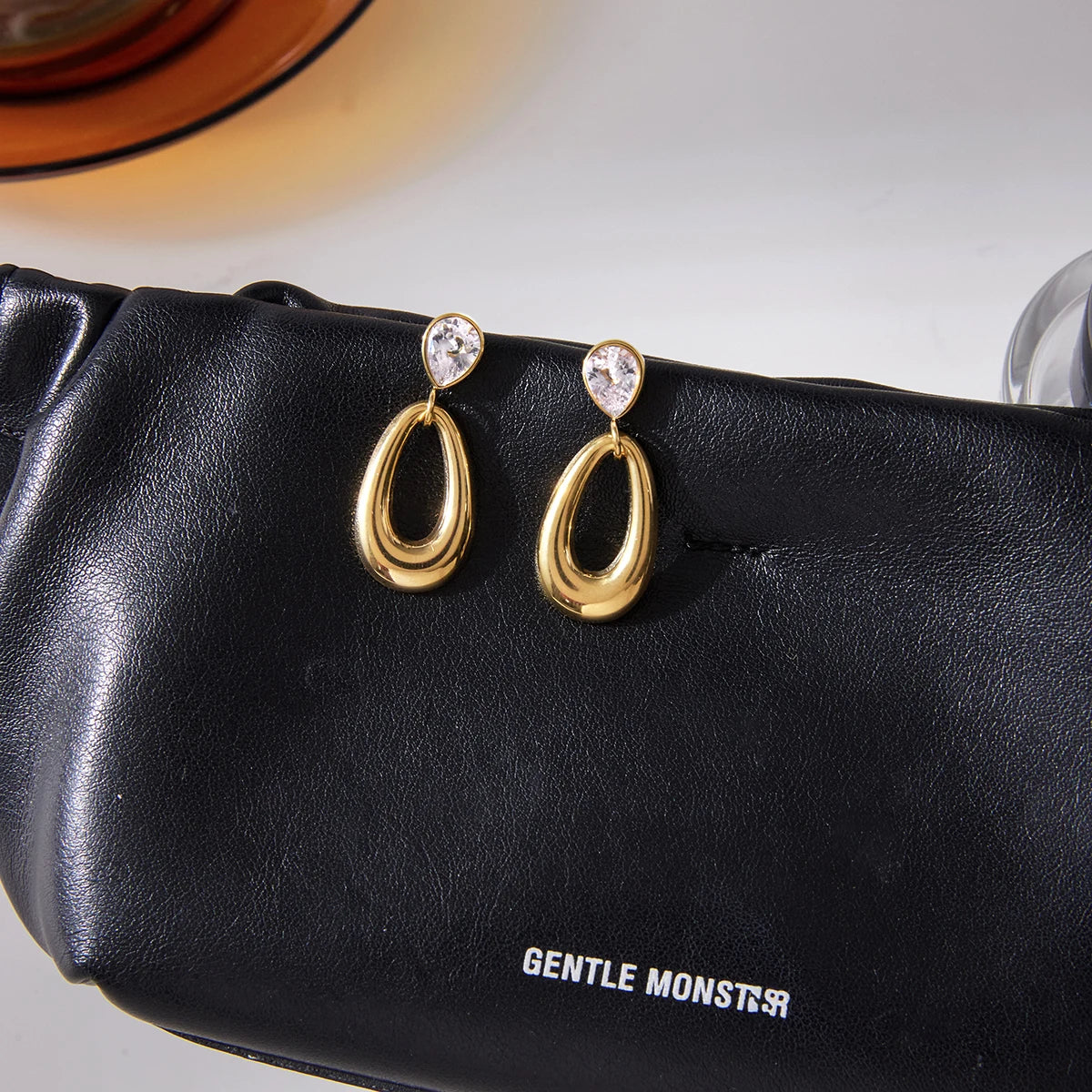Kika Water Drop Shaped Hollow Pendant Earrings
